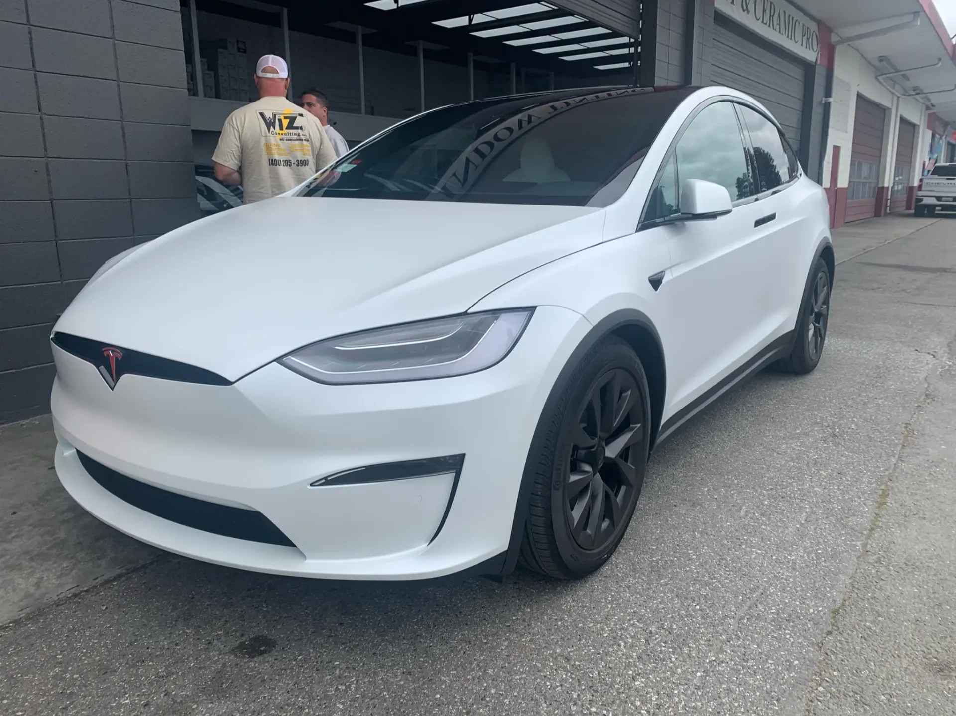 Paint protection film being applied to a car hood