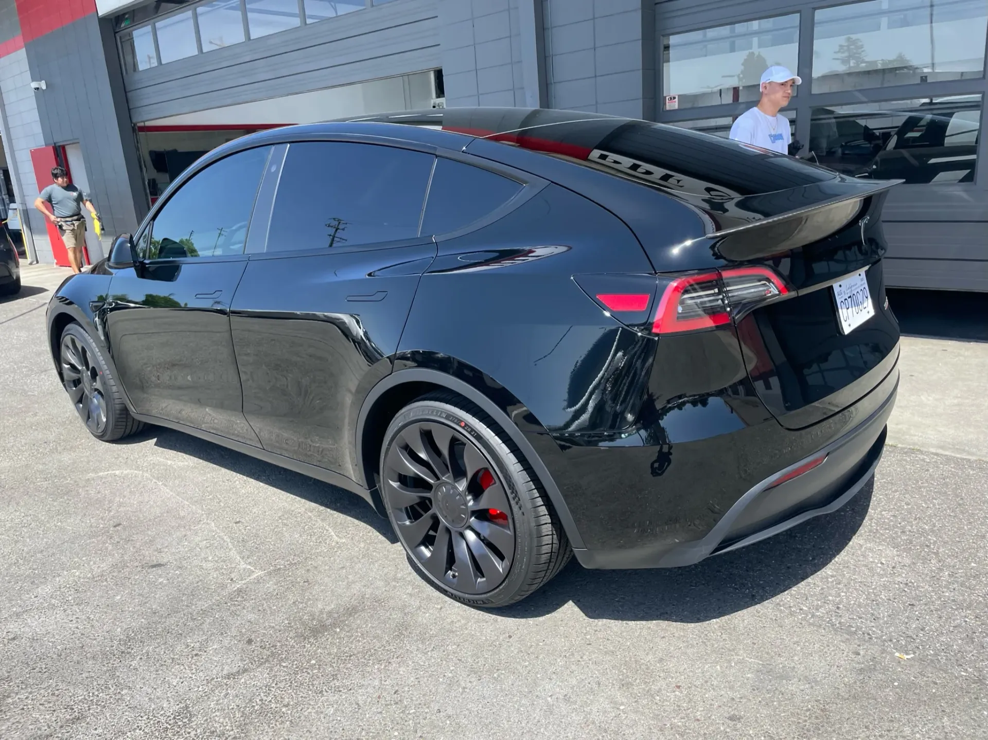 Ceramic coating beading water on a car panel